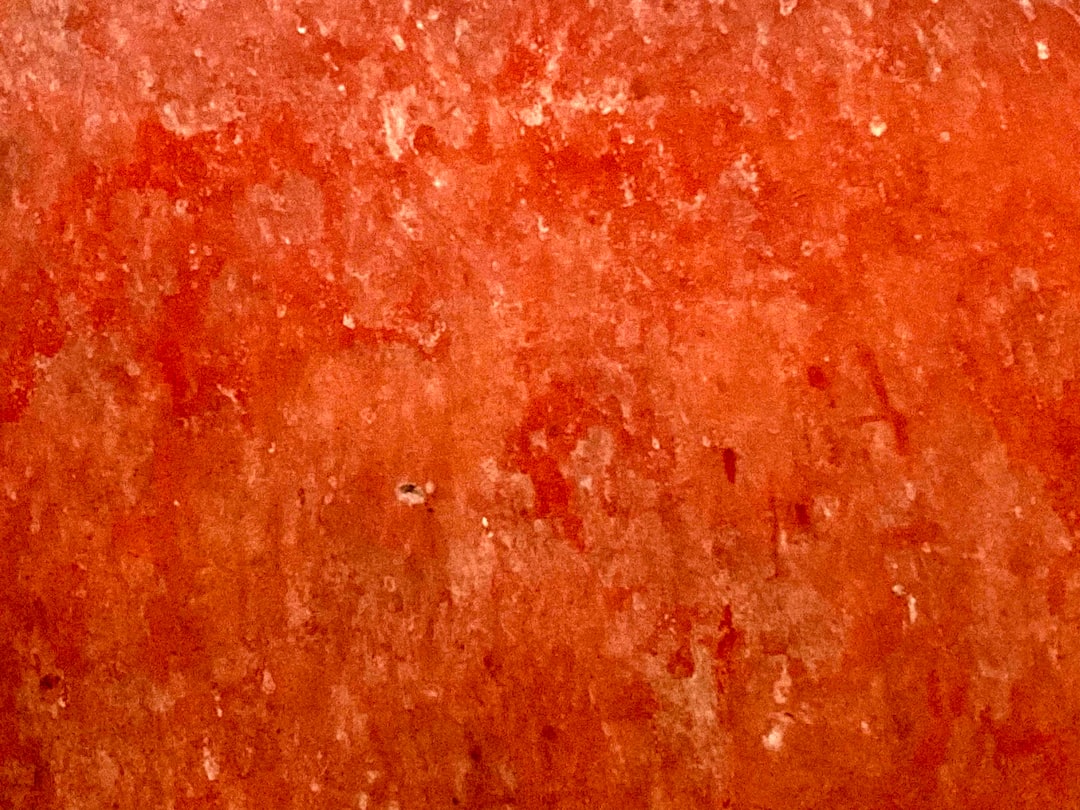 Close-up of high-grade Himalayan salt crystals showing various shades of pink and orange
